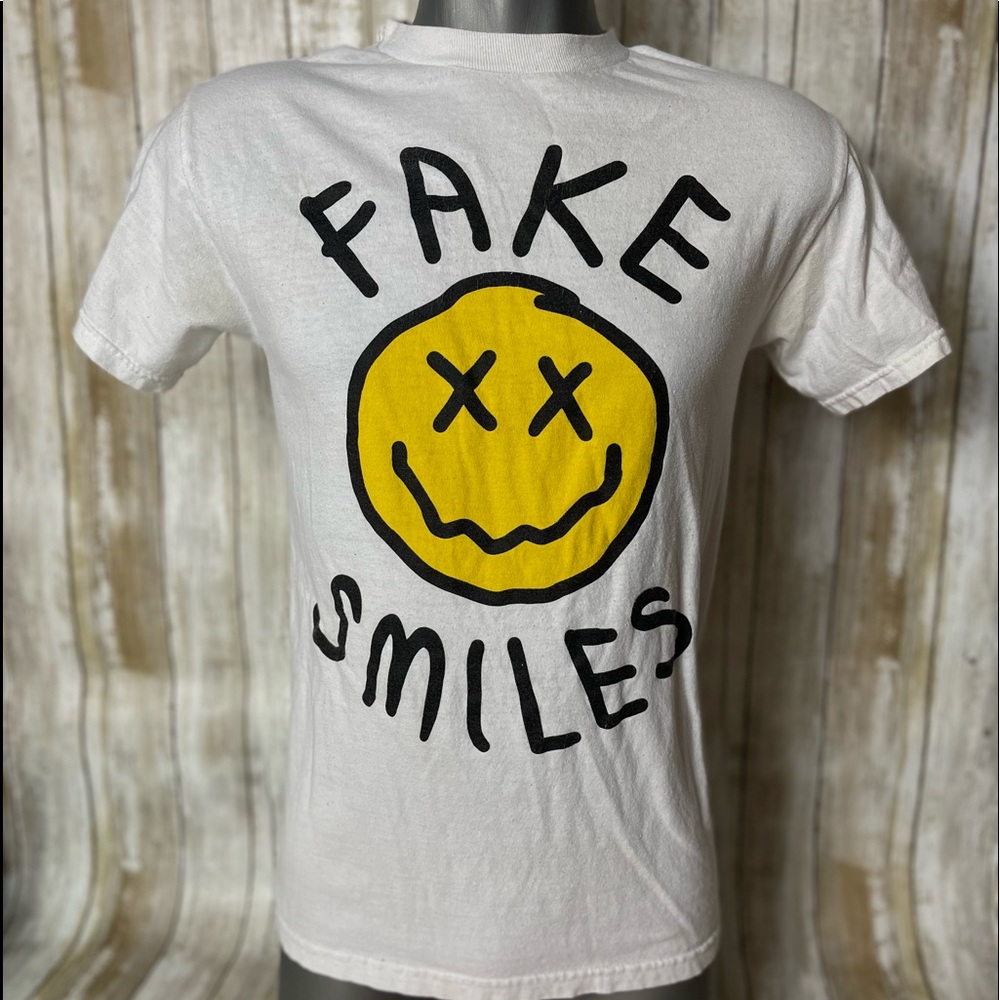 Yours truly “fake smiles” graphic tee.